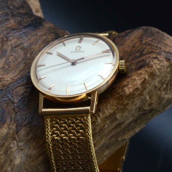 Omega Auto or tréssé