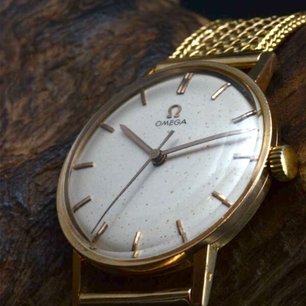 Omega Auto or tréssé