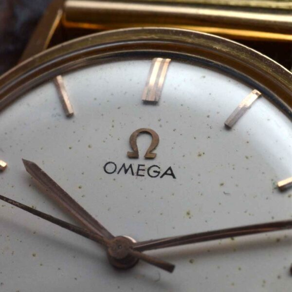 Omega Auto or tréssé