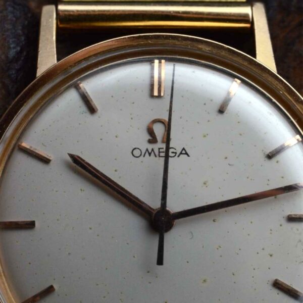 Omega Auto or tréssé