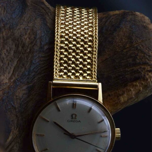 Omega Auto or tréssé