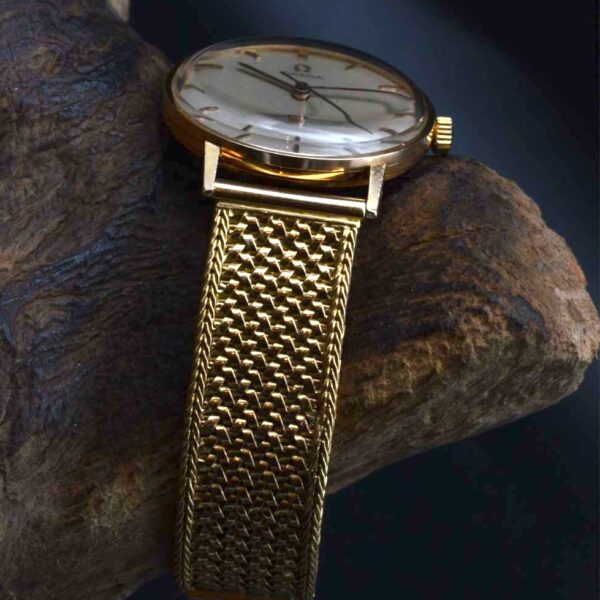 Omega Auto or tréssé