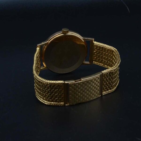 Omega Auto or tréssé