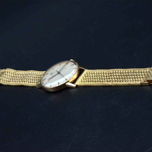 Omega Auto or tréssé
