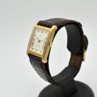 universal geneve or jaune